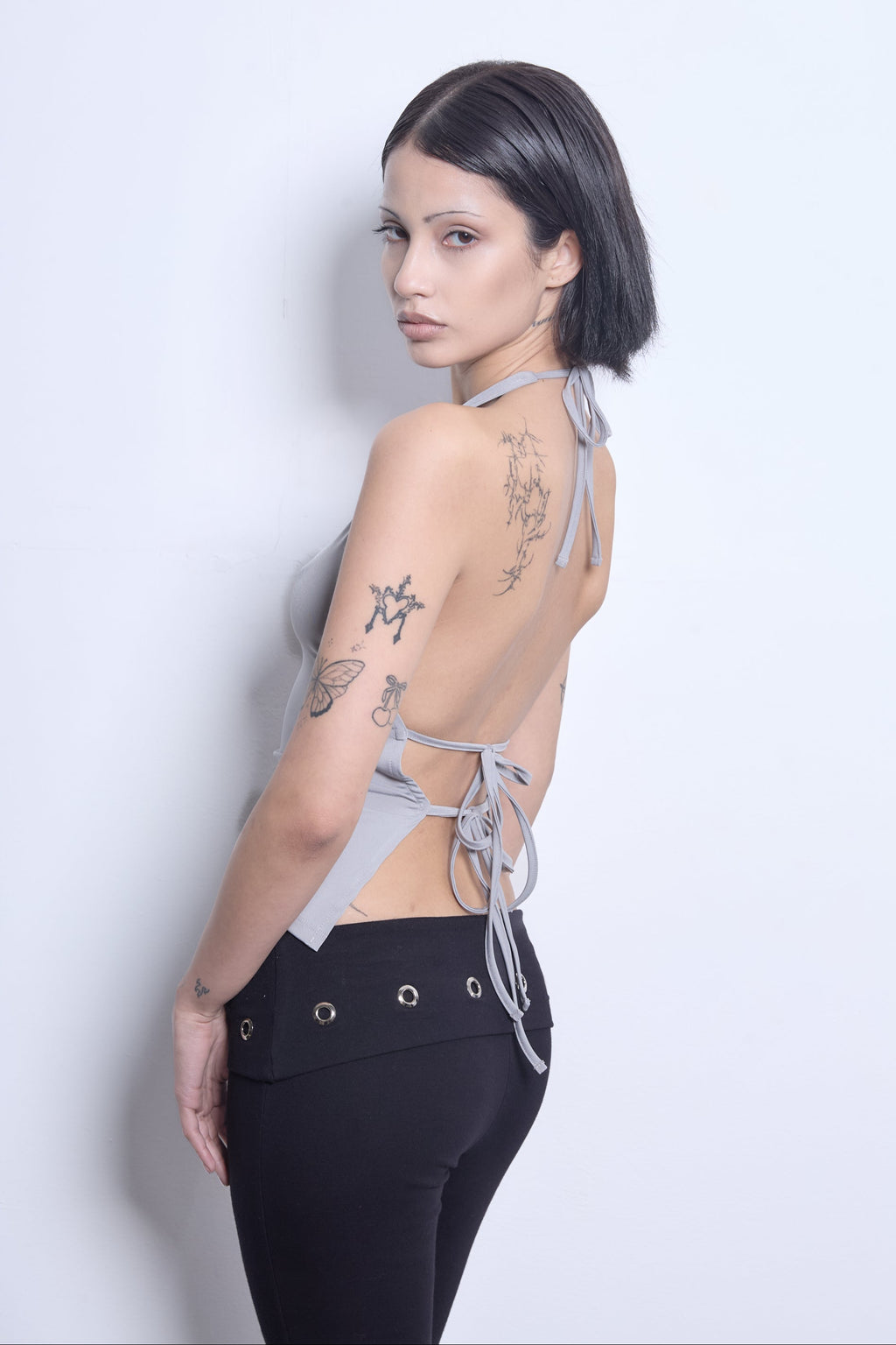 top gigi gris mujer 